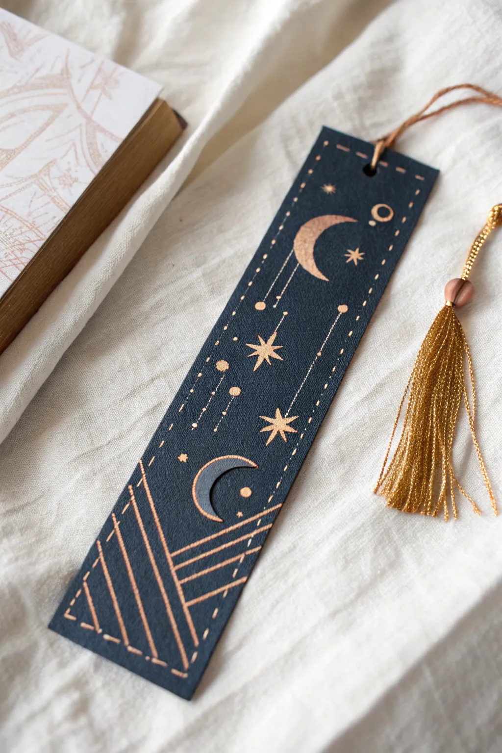 Acrylic bookmark with faux metallic moons and stars, layered highlights for a reflective glow.