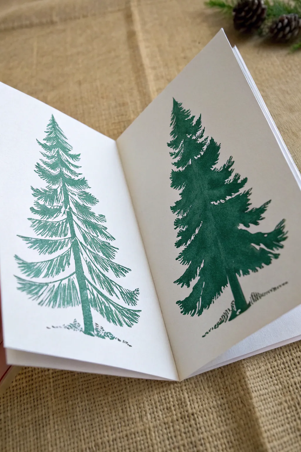 Fold, press, and open to reveal a mirrored Christmas tree, an easy kids symmetry print.