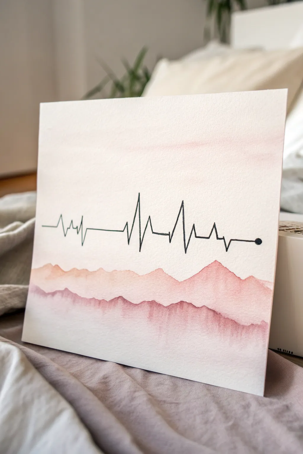 Minimal EKG line morphs into calm mountains and waves, a chic Scandinavian-boho painting idea