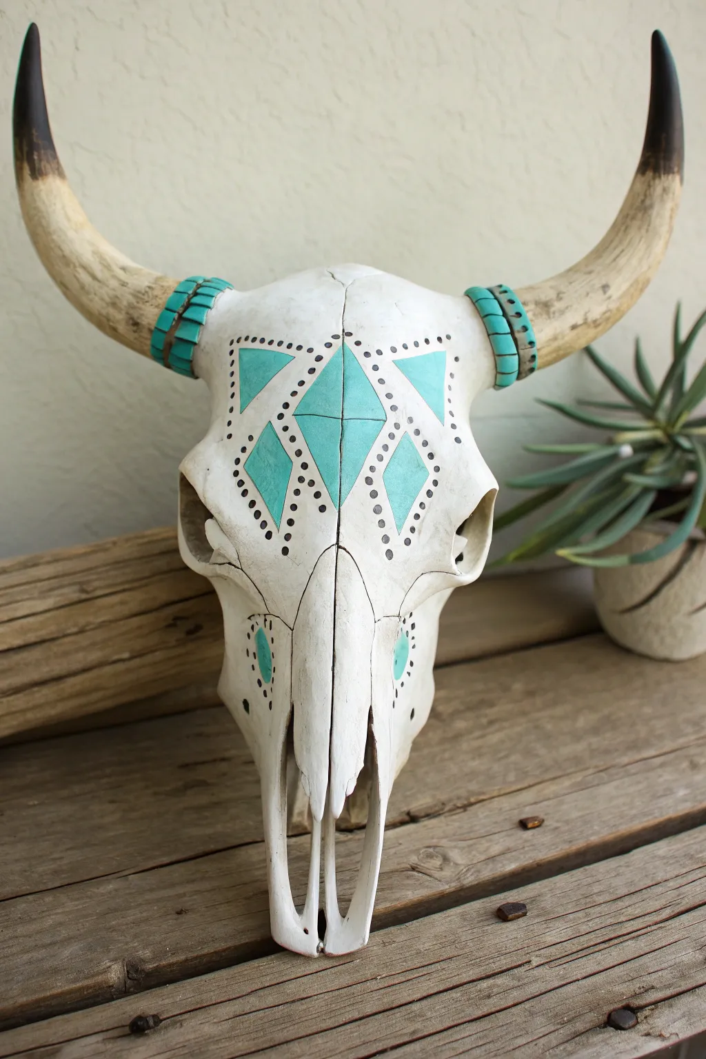 Painted cow skull with faux turquoise inlay illusion, minimalist boho craft inspiration