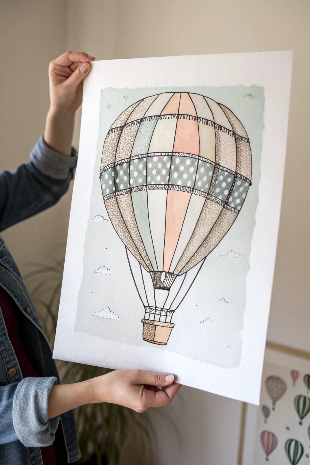 Patchwork hot air balloon panels make an easy, calming paint-in drawing idea for any sketchbook.