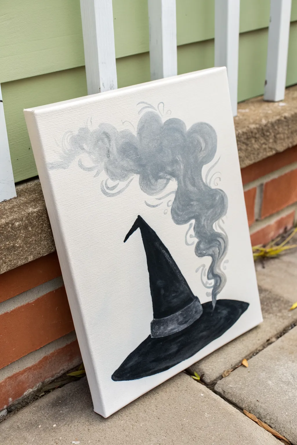 Simple witch hat silhouette with swirling smoky shadows, minimalist creepy acrylic idea