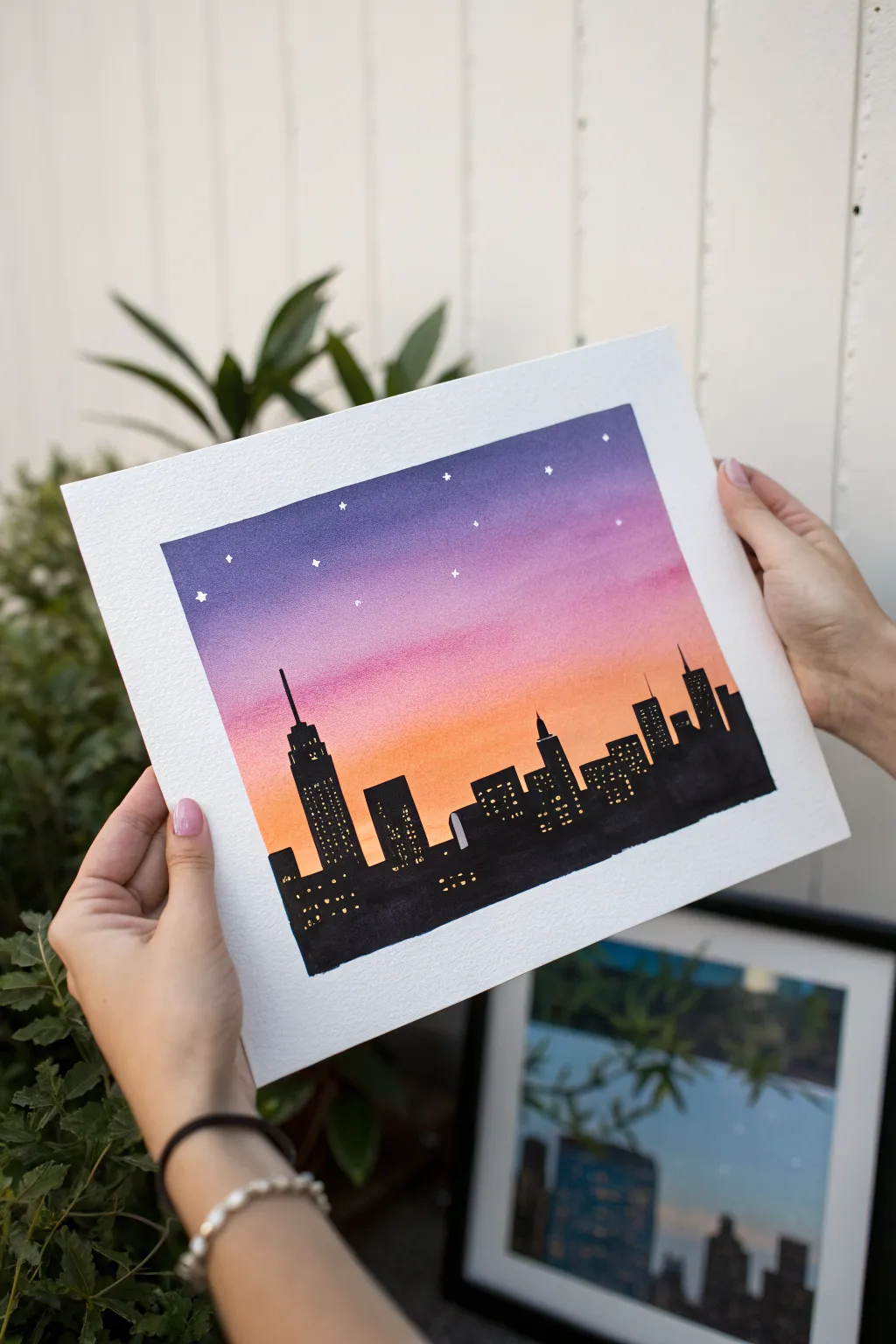 Minimal skyline silhouette with twilight gradient, a cozy beginner-friendly painting idea