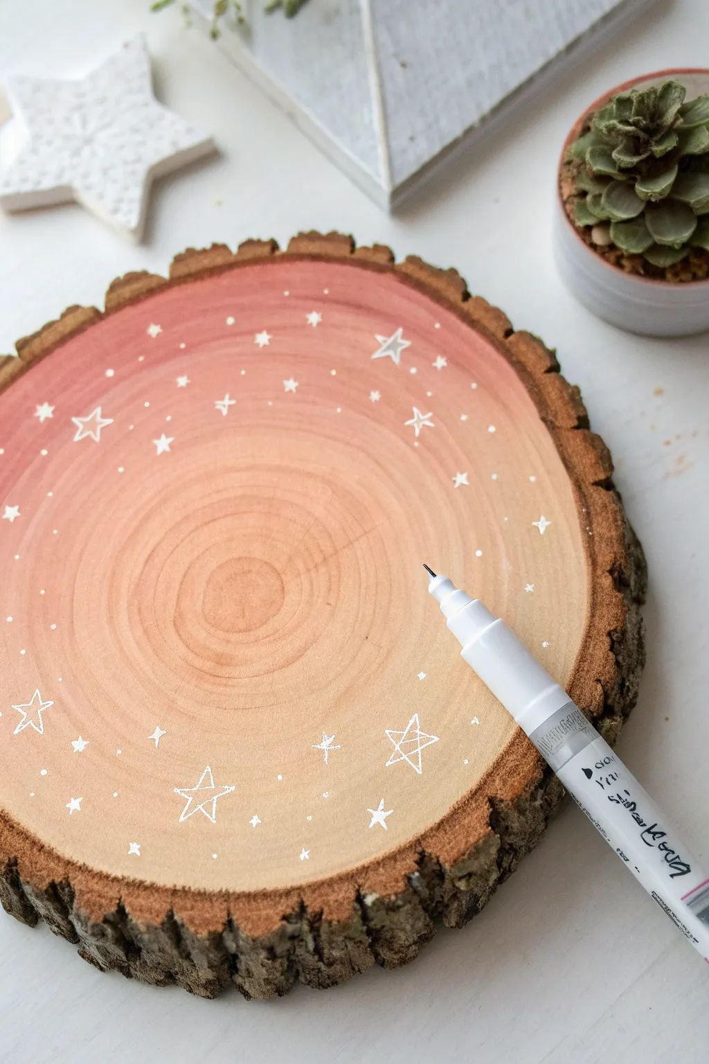 Ombre wash wood slice with simple white doodles for an easy, minimalist wood painting idea