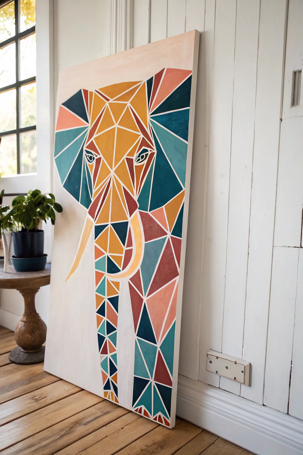 Geometric color-block elephant acrylic painting idea with crisp edges and a minimalist boho palette