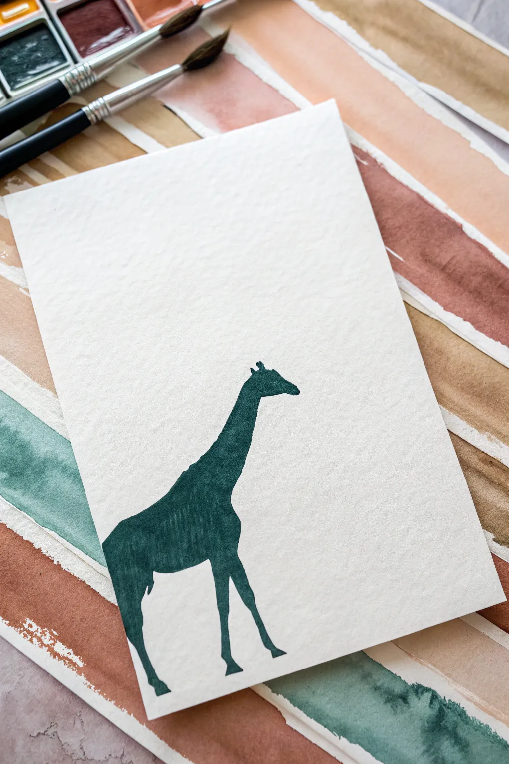 Negative space giraffe silhouette on a textured boho color wash background, minimalist and elegant.
