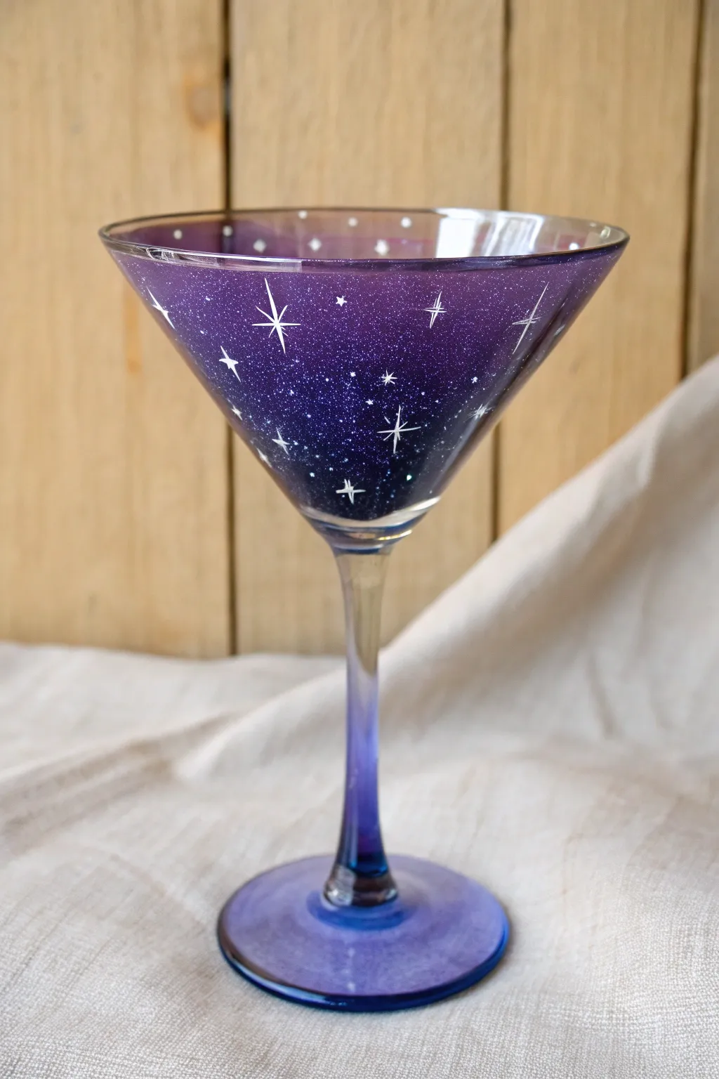 Galaxy night sky martini glass with indigo-violet gradient and delicate starry shimmer