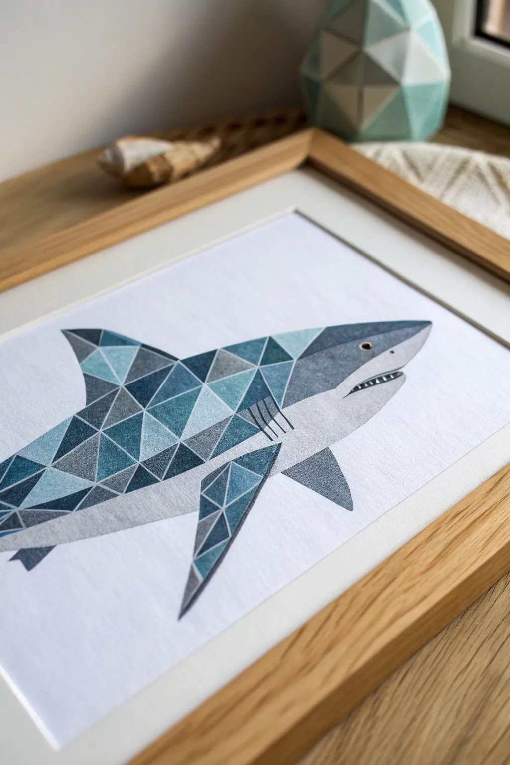 Geometric faceted shark in cool grays and blues, clean Scandinavian minimalism with boho warmth.