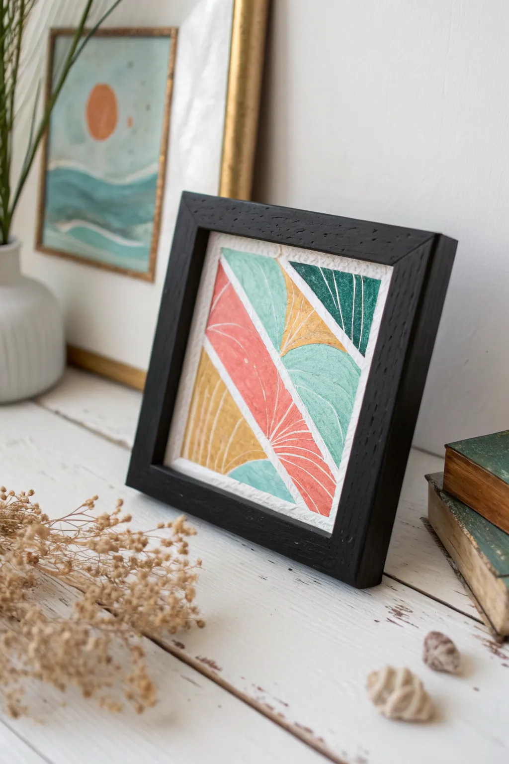 Scratch-through painted layers with etched lines and bright colors peeking through the dark surface