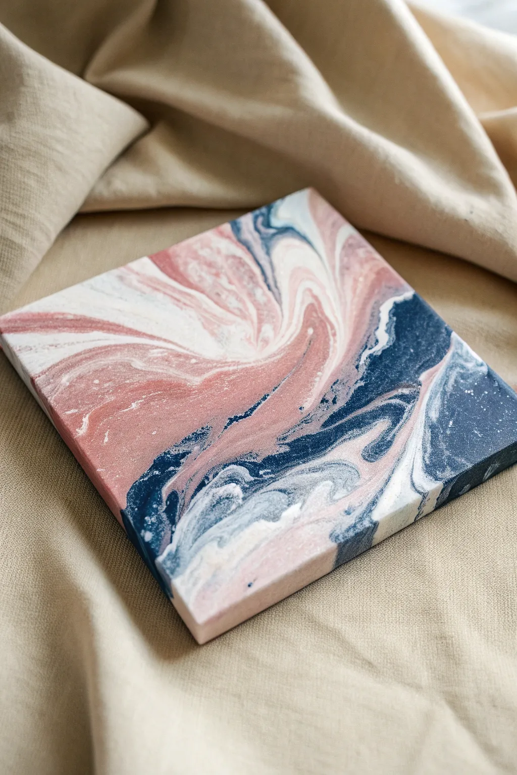 Two-color abstract swirls on a tiny canvas, an easy marbled look for absolute beginners.