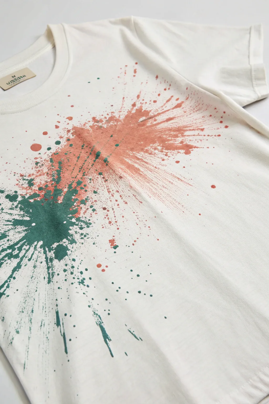 Central spray burst tee: minimalist white shirt with vibrant layered splatter for bold DIY energy