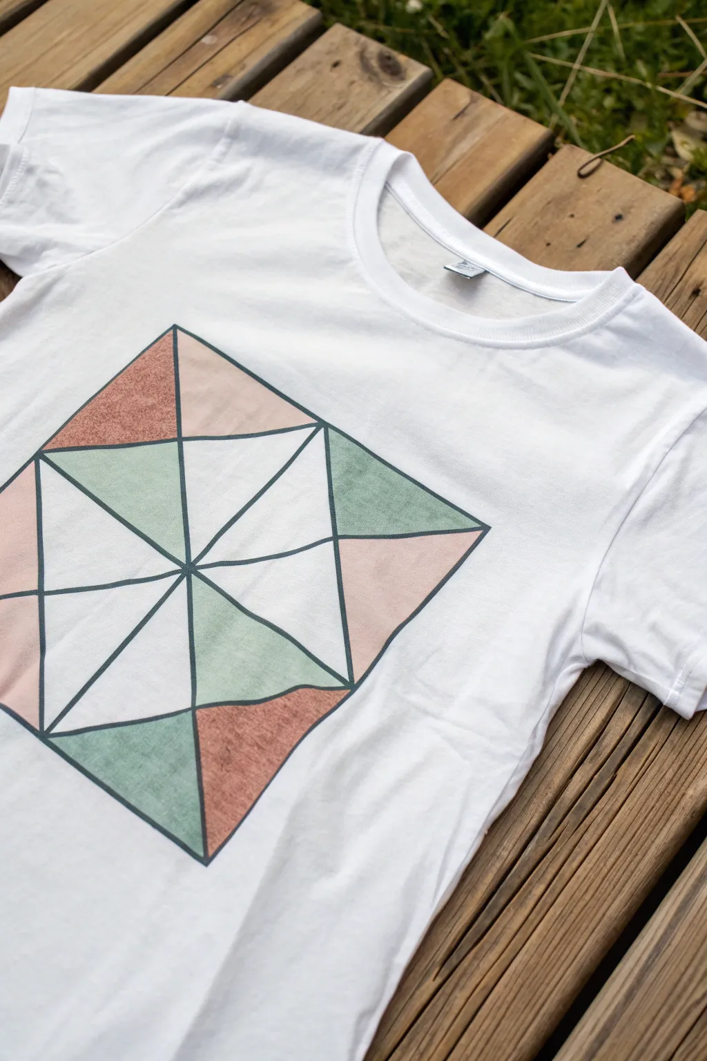 Beginner-friendly stained-glass leaf: crisp black lines with a few muted color sections