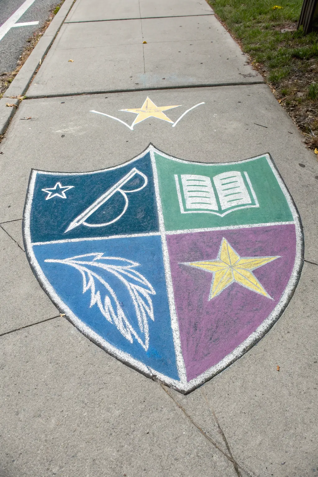 Stained-glass sidewalk chalk crest in bold colors, a minimalist back-to-school showpiece.