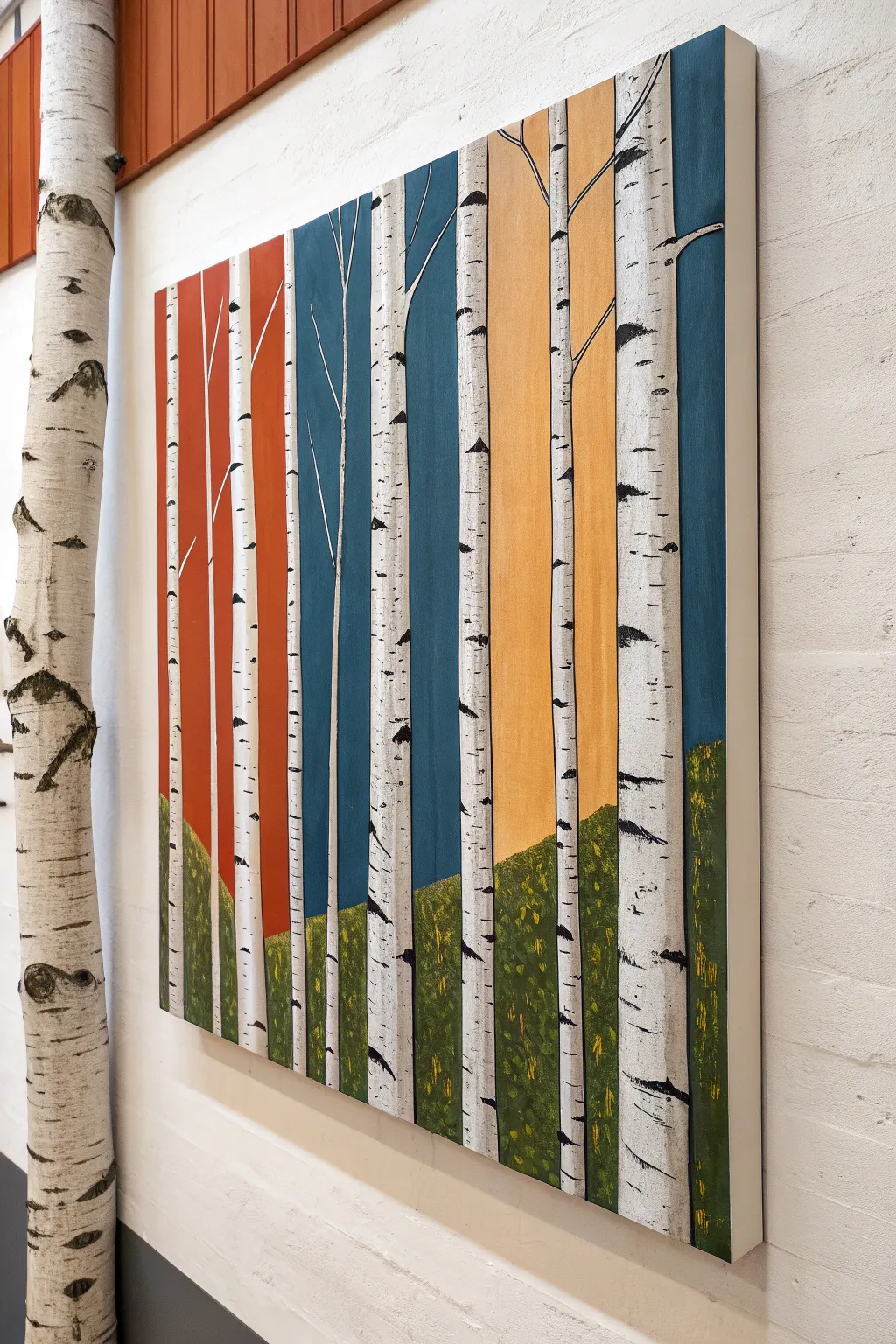 Bold color blocks meet minimalist birch trunks in a Scandinavian boho abstract painting idea