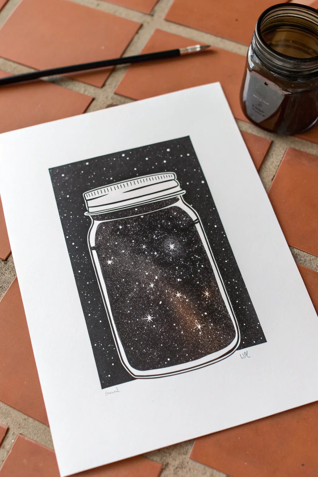 Stippled galaxy in a jar: crisp black ink dots with bright star highlights on white paper