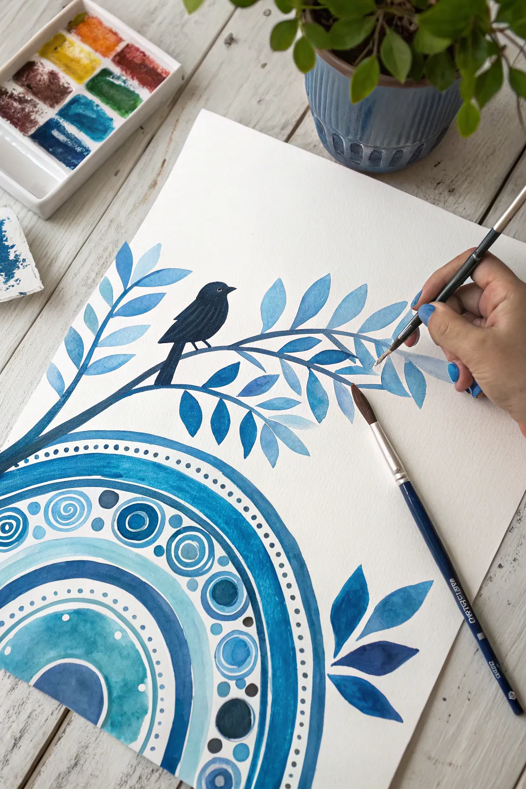Negative-space blues and a bold bird silhouette for a modern minimalist acrylic painting idea.