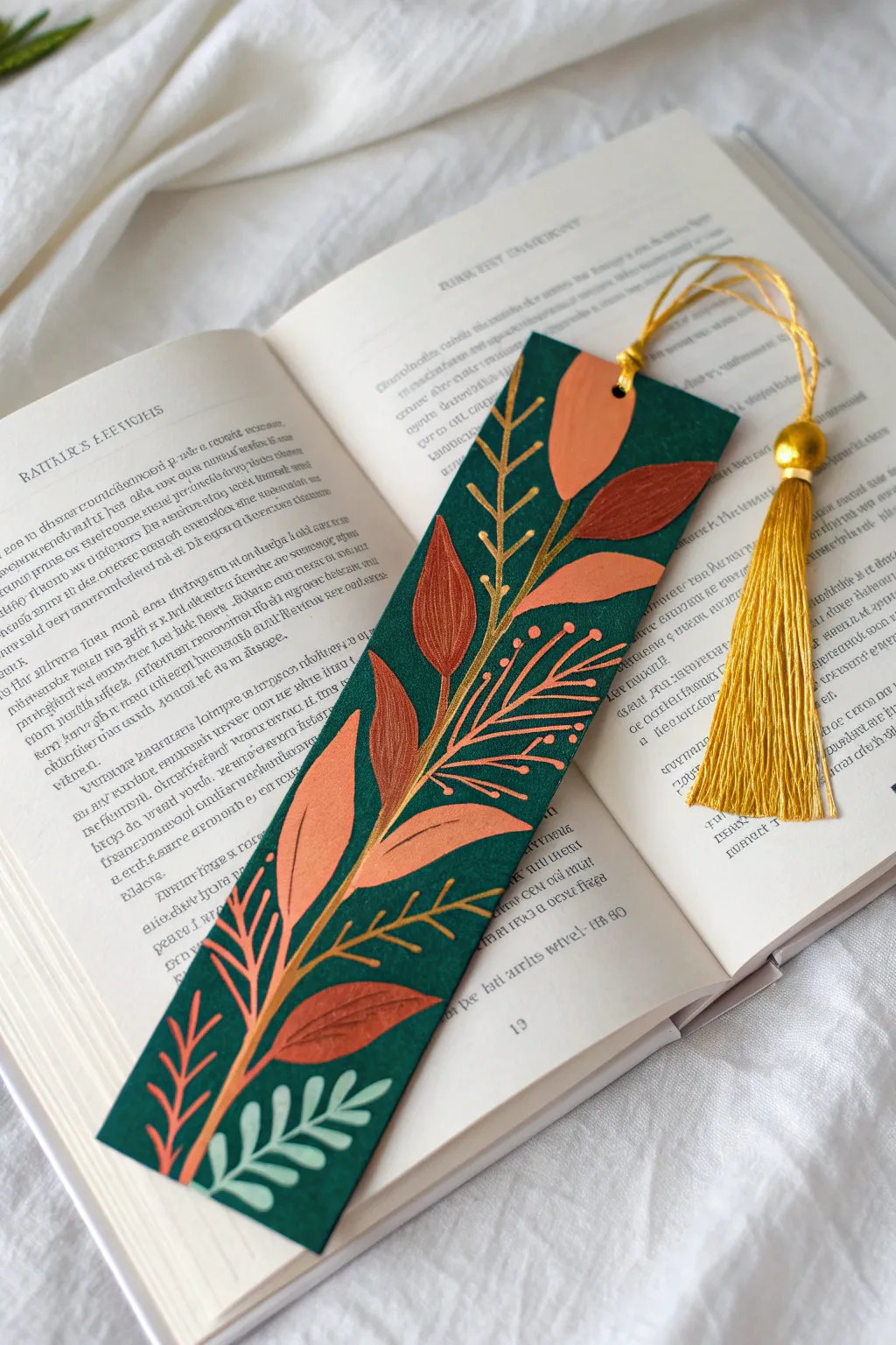 A silky tassel is the perfect finishing touch to elevate your painted bookmark.