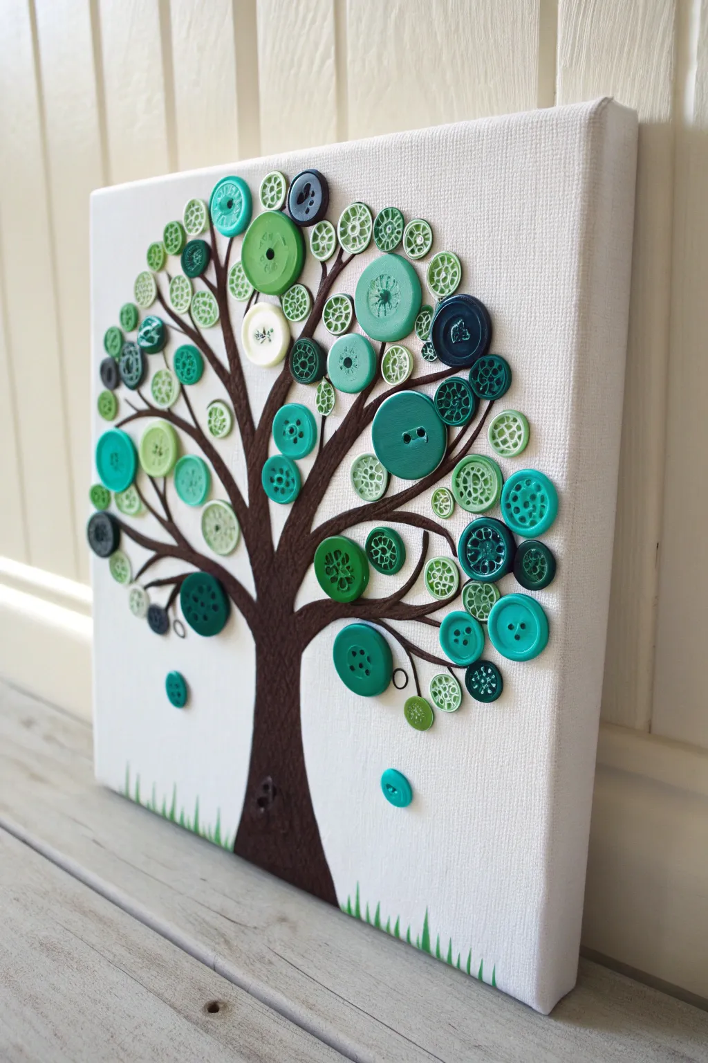 Turn spare buttons into a whimsical 3D tree canvas. A chic, colorful DIY accent for modern boho homes.