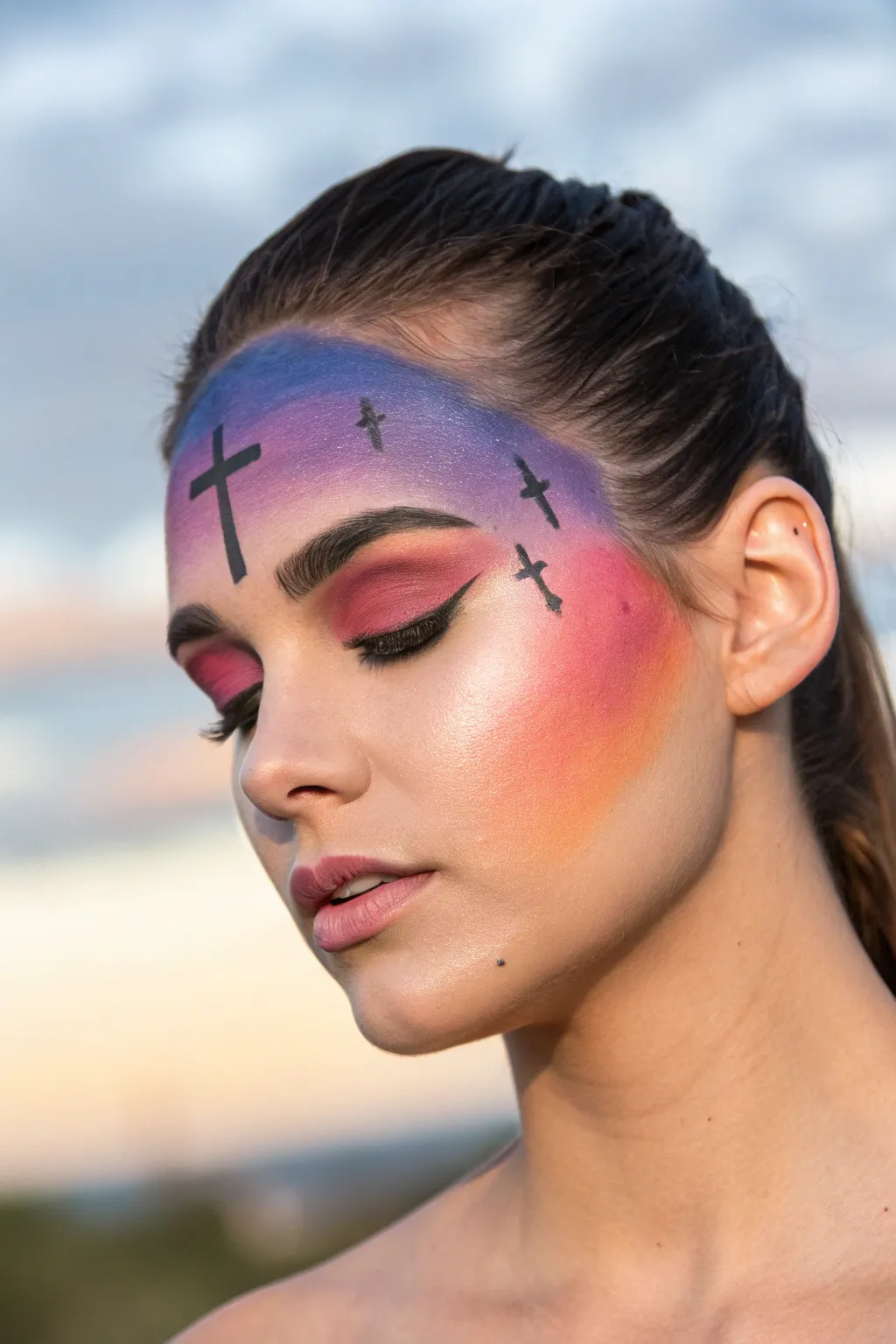 Dramatic Calvary sky face paint with three crosses and radiant light beams for Easter
