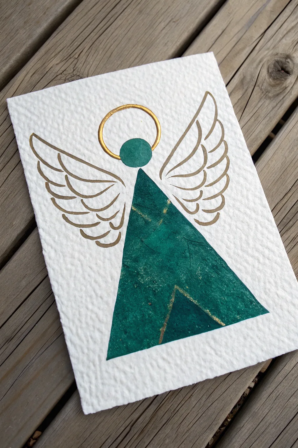 Simple yet stunning! 👼 Try this easy abstract triangular angel for your DIY holiday cards this year.