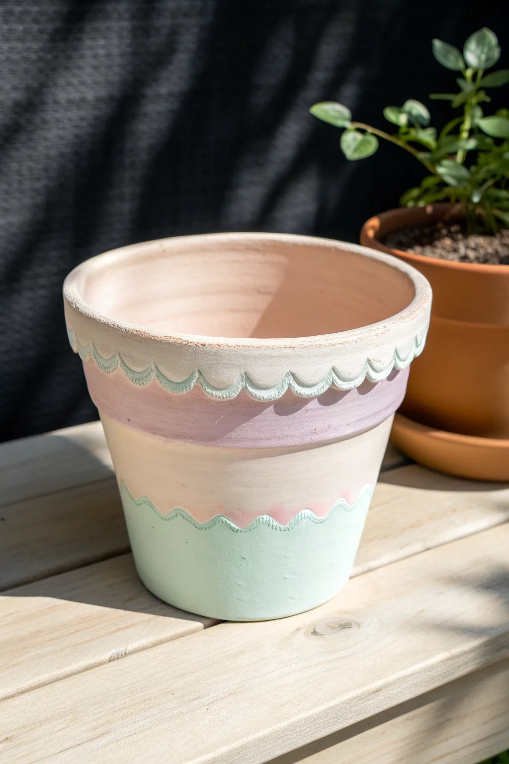 Scalloped rim in soft pastels on a simple pot for an easy Scandinavian boho look.