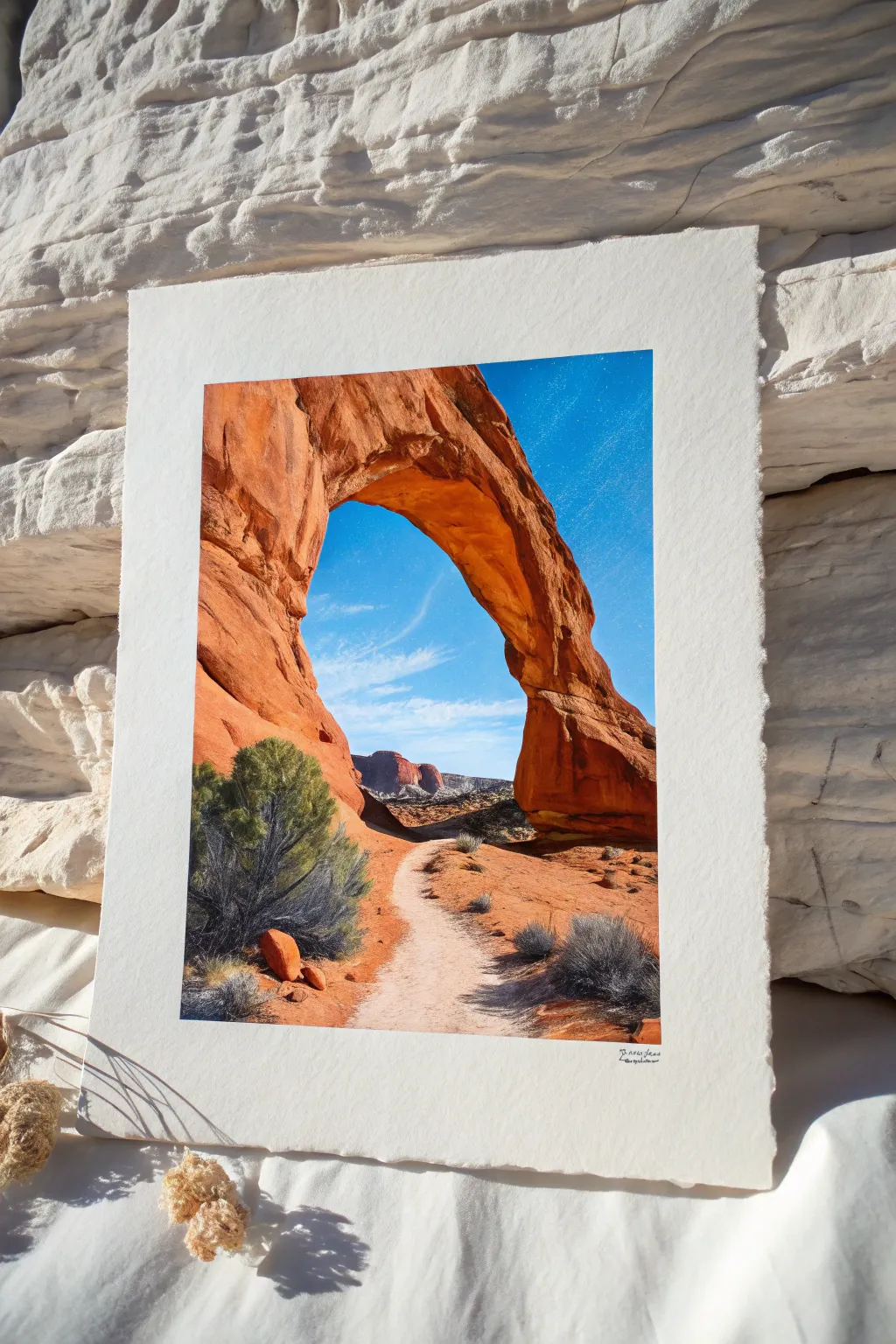 Sandstone arch painting idea: warm terracotta stone framing a bold blue sky, minimalist boho