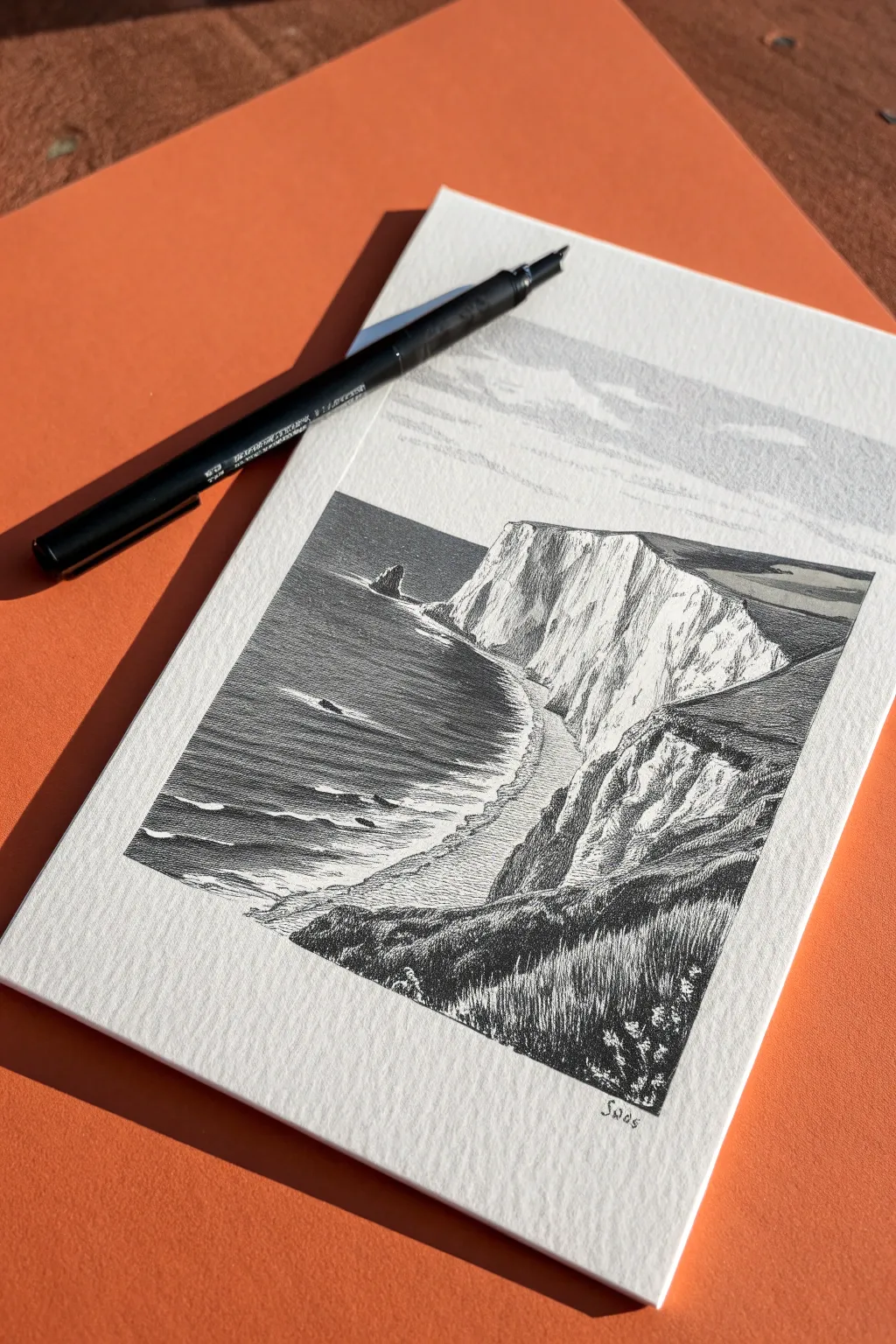 Capture the drama of the coast. Master these jagged lines for a stunning cliff edge sketch.