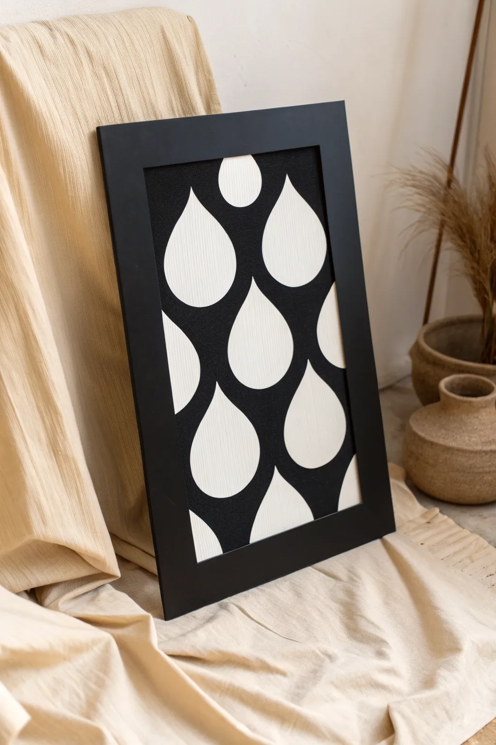 Bold negative-space drip cutout on black cardstock, minimal boho vibes, crisp contrast.