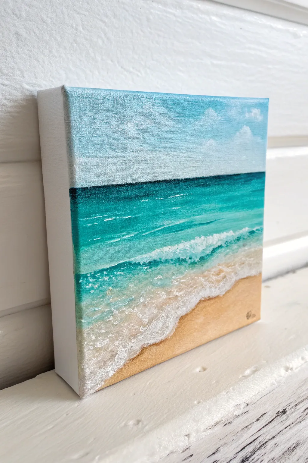 Minimal tropical beach painting with teal water and creamy sand in a bold, easy palette