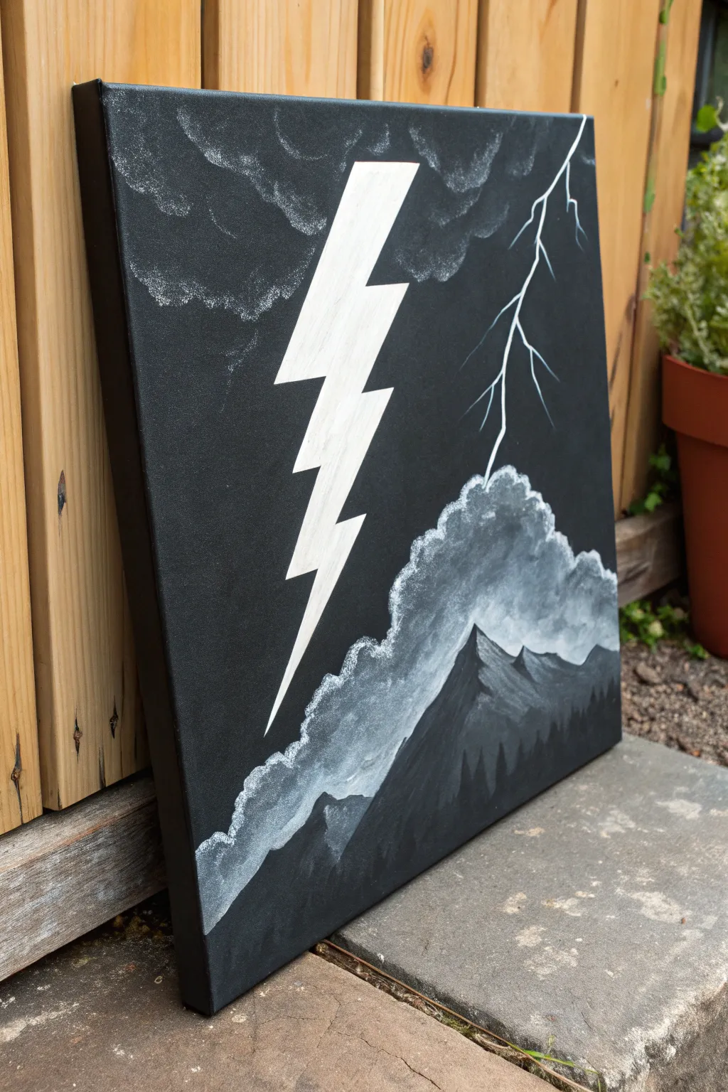 Bold white lightning on a black sky painting idea—minimal, dramatic, and easy to recreate.