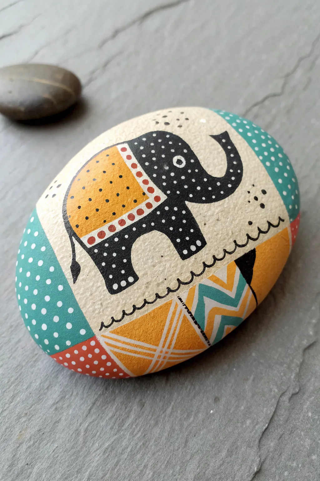 Patchwork quilt elephant rock: bold patterns in a minimalist Scandi-boho palette.