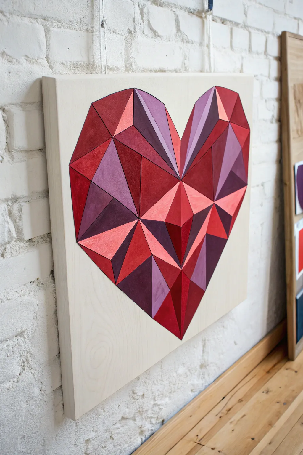 Master the art of geometry with this stunning faceted crystal heart painting idea.
