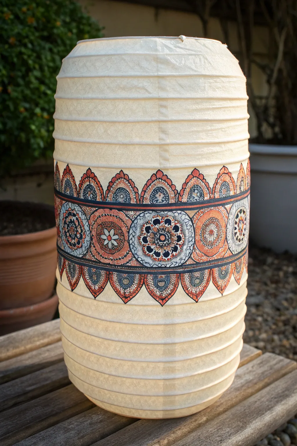 Mandala rings around a ribbed paper lantern, crisp dots and lines in bold boho color.