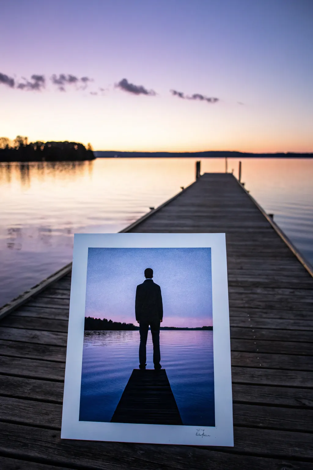 Dock silhouette pulling you into a purple-blue twilight lake, simple and striking painting inspiration