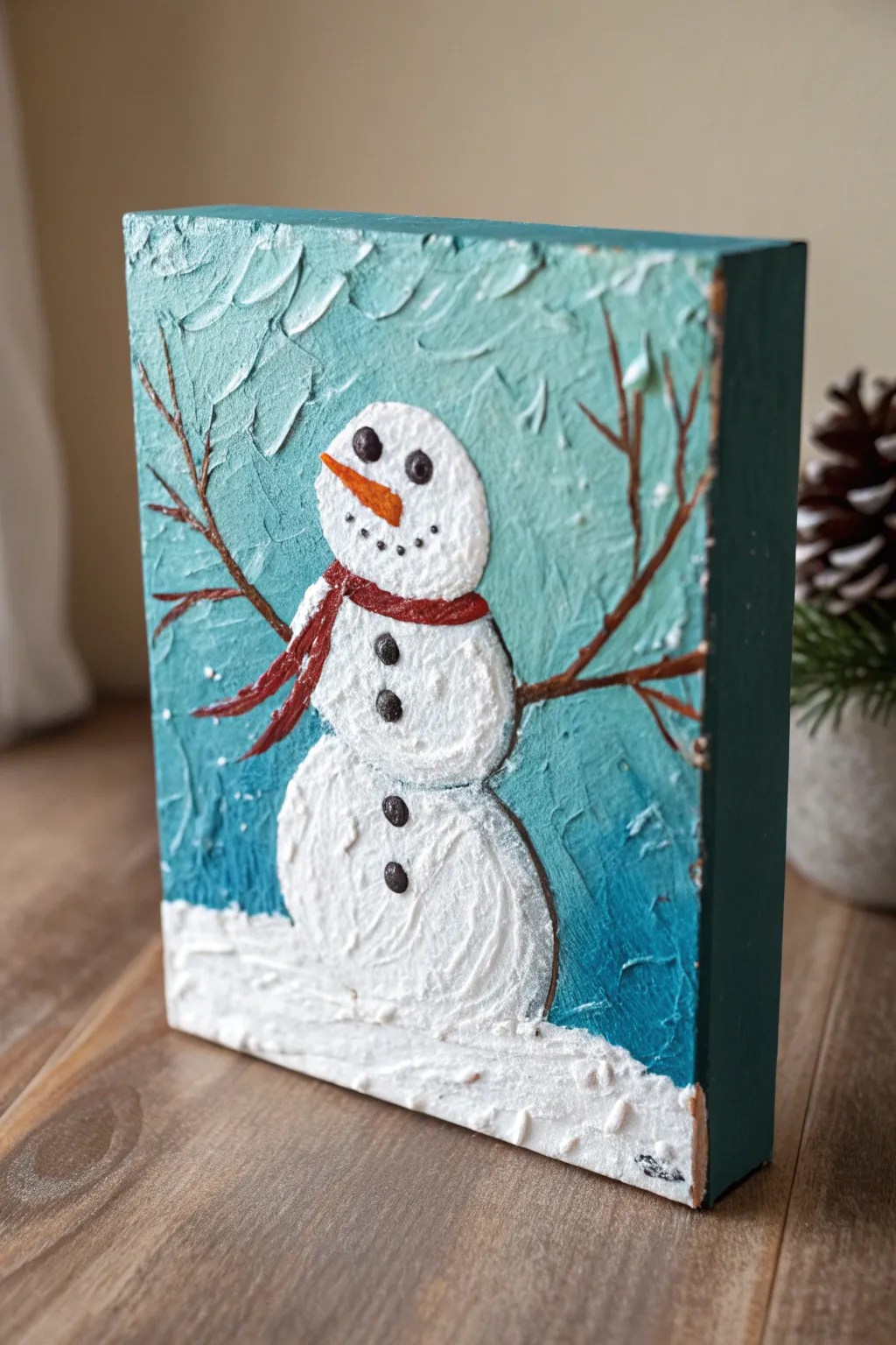 Chunky impasto snowman with raised snowy texture and bold Nordic-boho color contrast