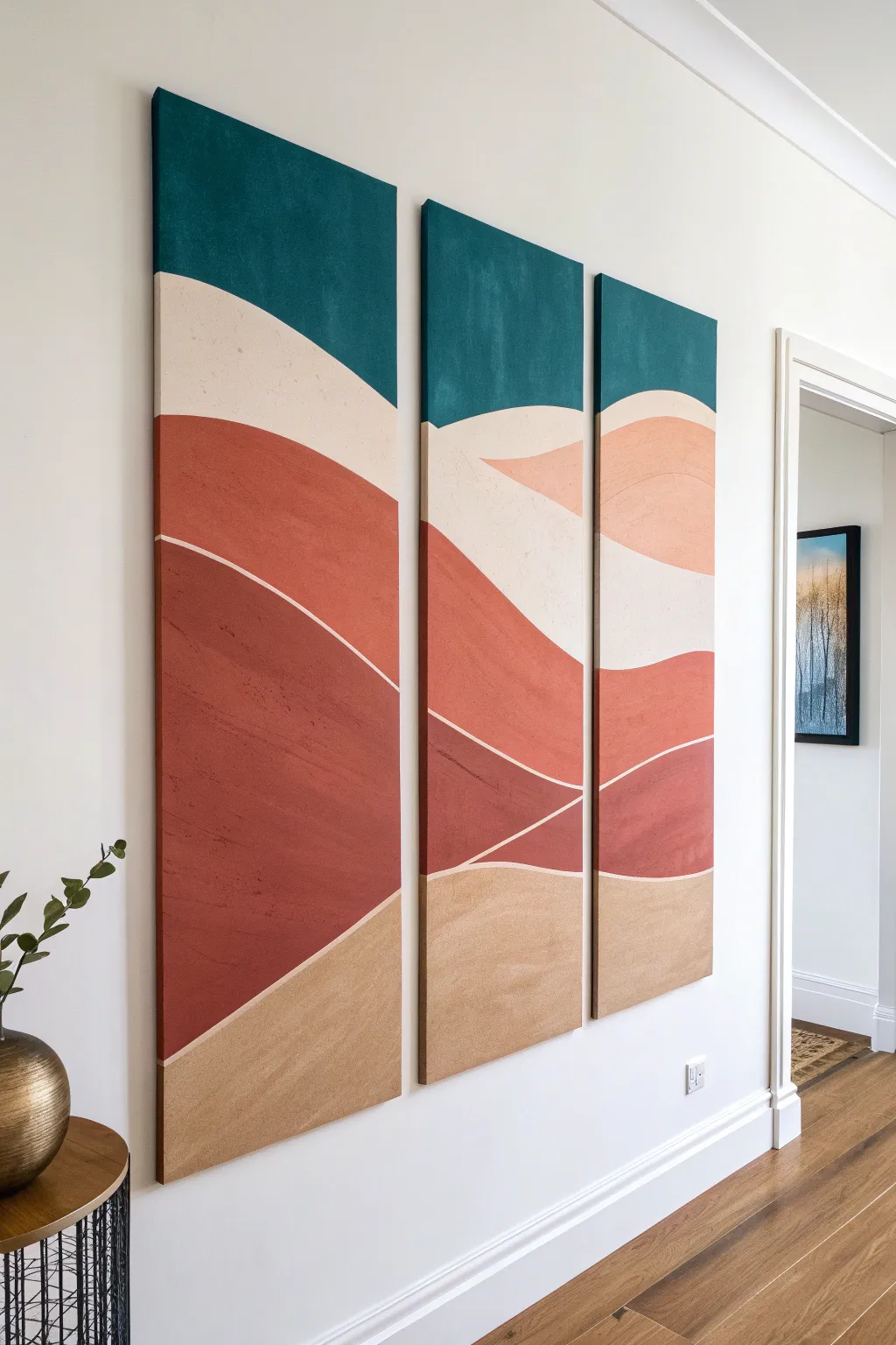 Stepped split-canvas triptych with bold sunset hues for dynamic minimalist wall art.