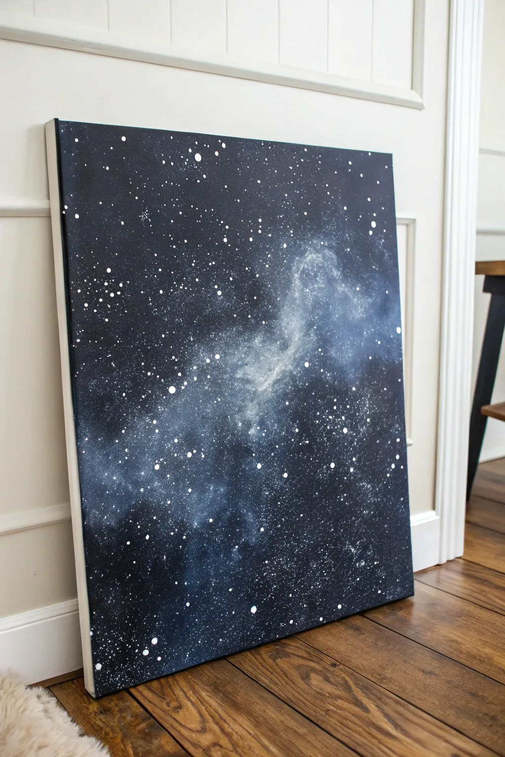 Dark galaxy splatter on white canvas with crisp starbursts for dramatic minimalist sparkle