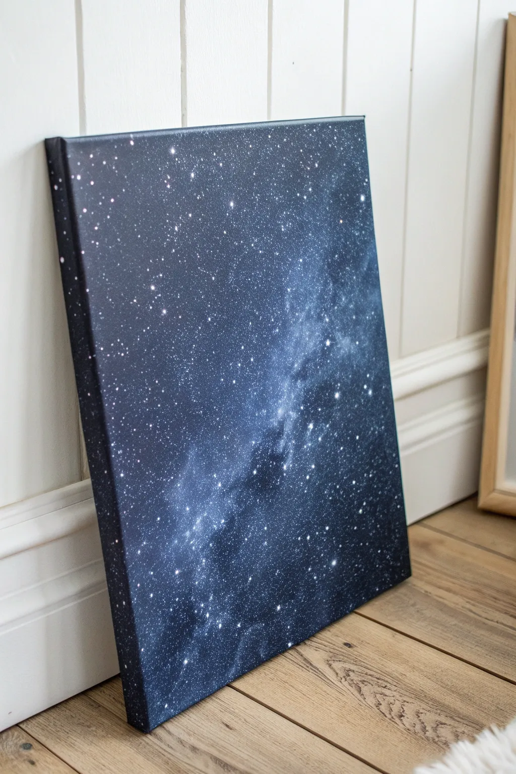 Salt speckle galaxy canvas background: deep indigo wash with soft blooms and minimal stardust