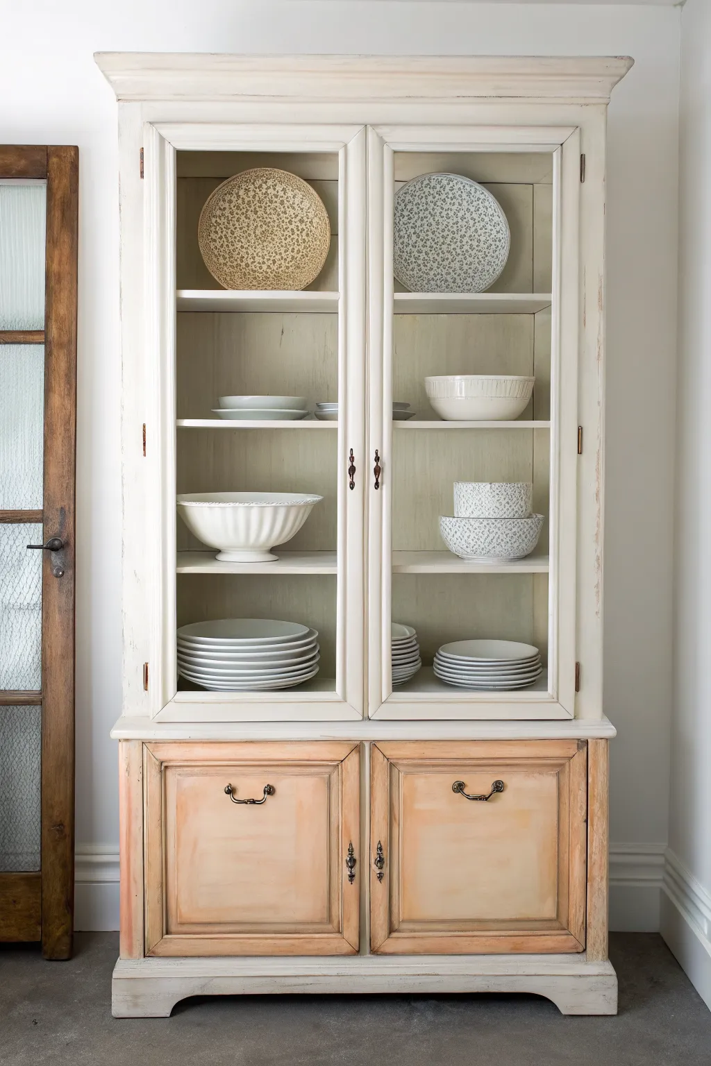 Ombre shelves add a dreamy surprise inside this chalk-painted china cabinet makeover.