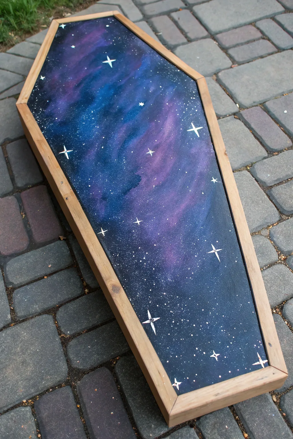 Nebula blues and violets melt into midnight black, finished with delicate white star splatter.