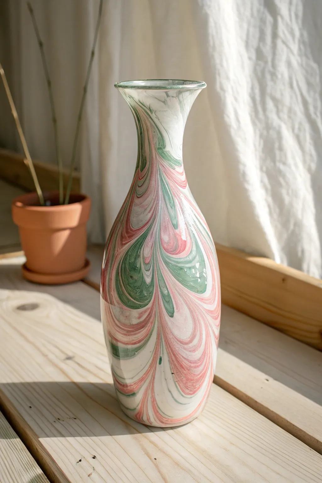 Hydro-dipped marbled swirls on a glass vase for an easy, wow-finish beginner project