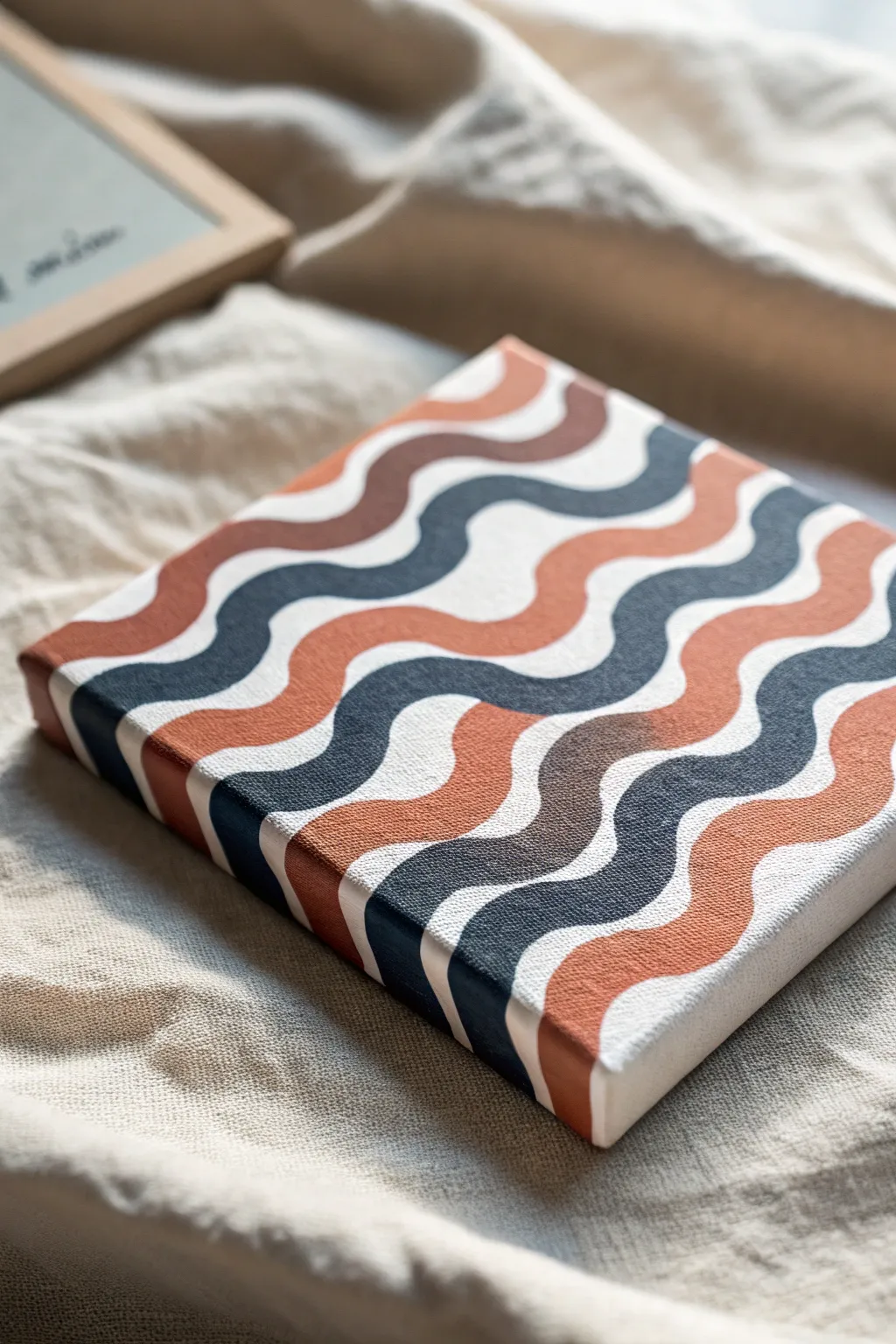 Beginner friendly geometric wave canvas in 3 calming colors with crisp edges and modern contrast