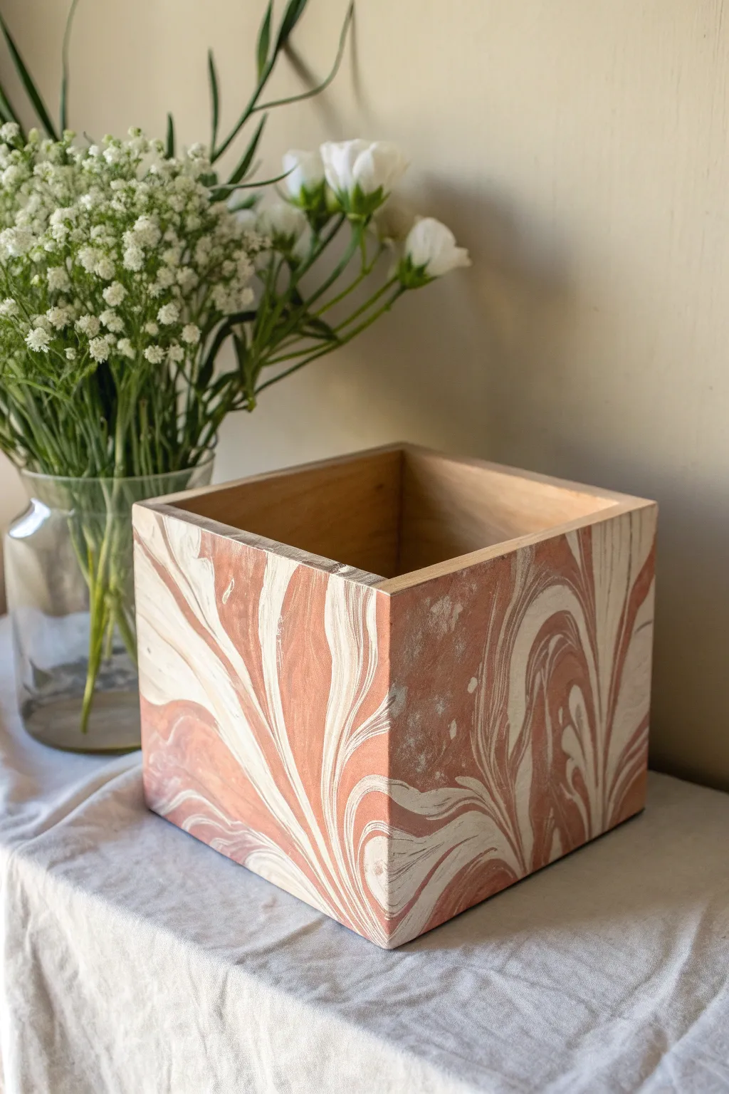 Marbled swirls turn a simple flower box into an artsy Scandinavian-boho statement