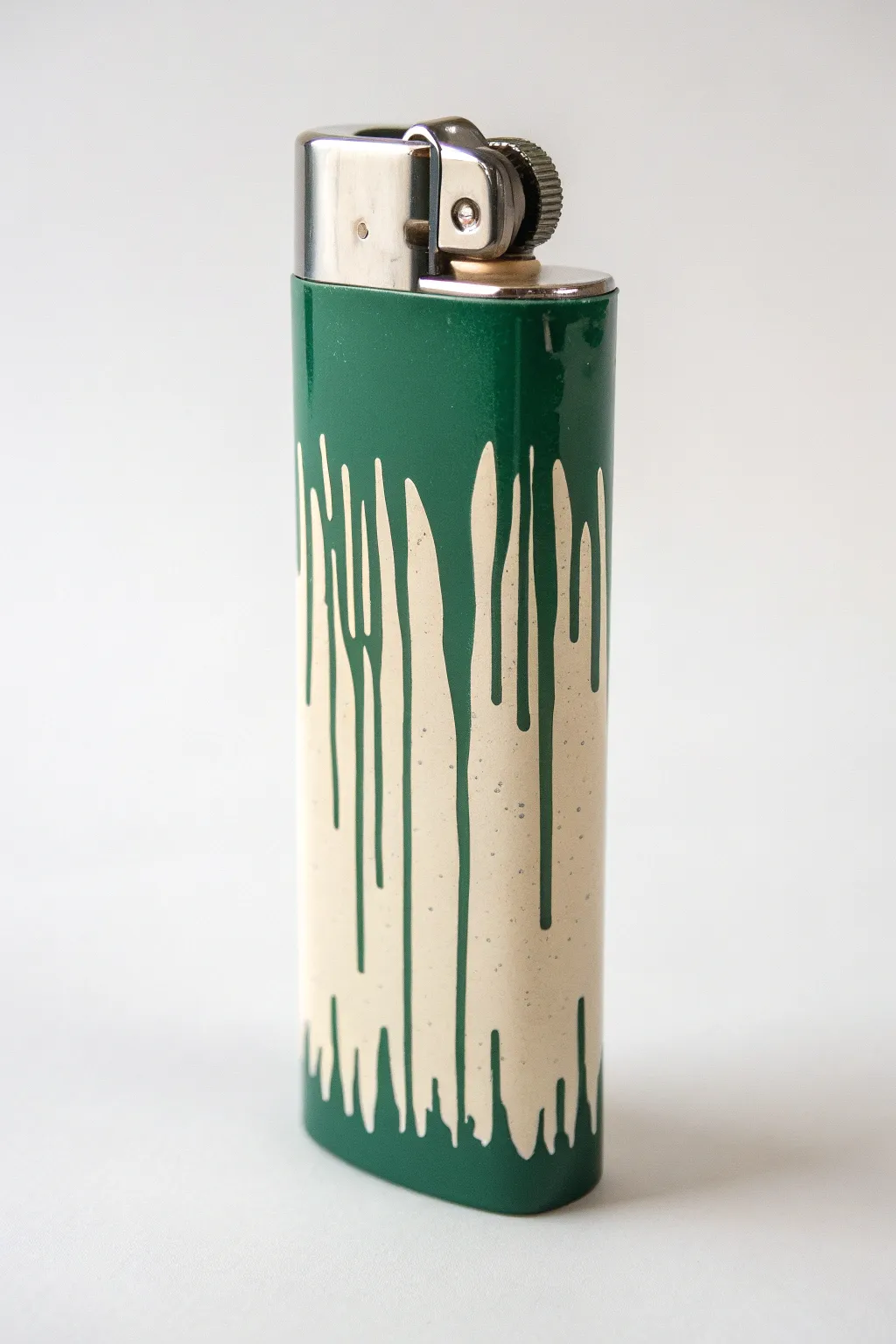 Glossy drip-painted lighter with bold contrast, clean minimal styling, and bright window highlights