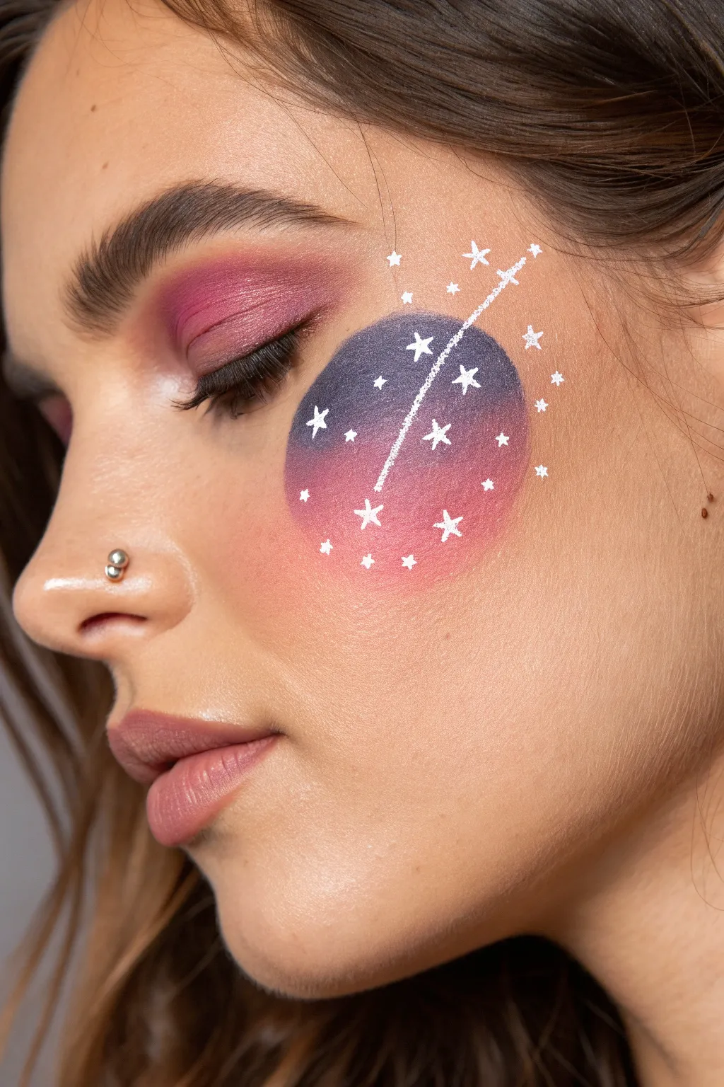 Minimal galaxy cheek wash with tiny stars and one constellation, easy and elegant to recreate