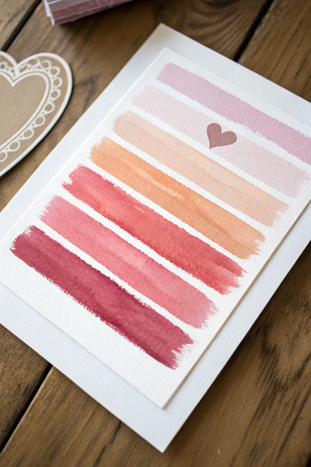Valentine color-bar painting with a clean heart cutout, perfect for a cozy paint and sip