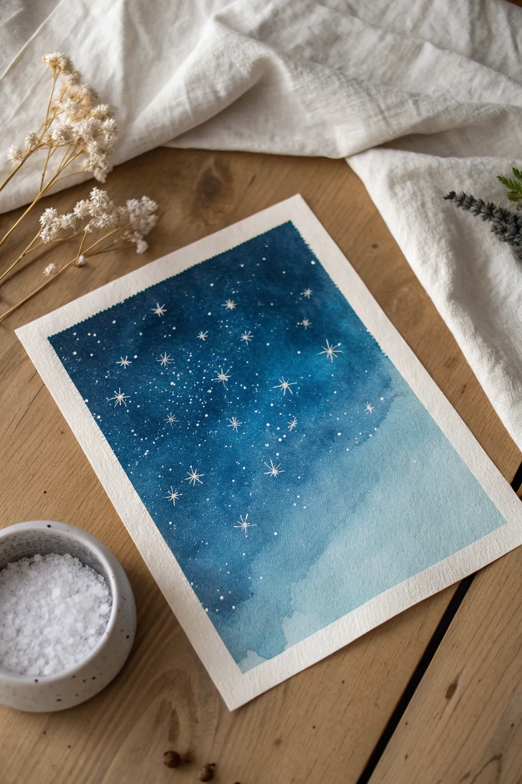 Salt crystals turn a simple sky wash into sparkling stars and snowy watercolor textures