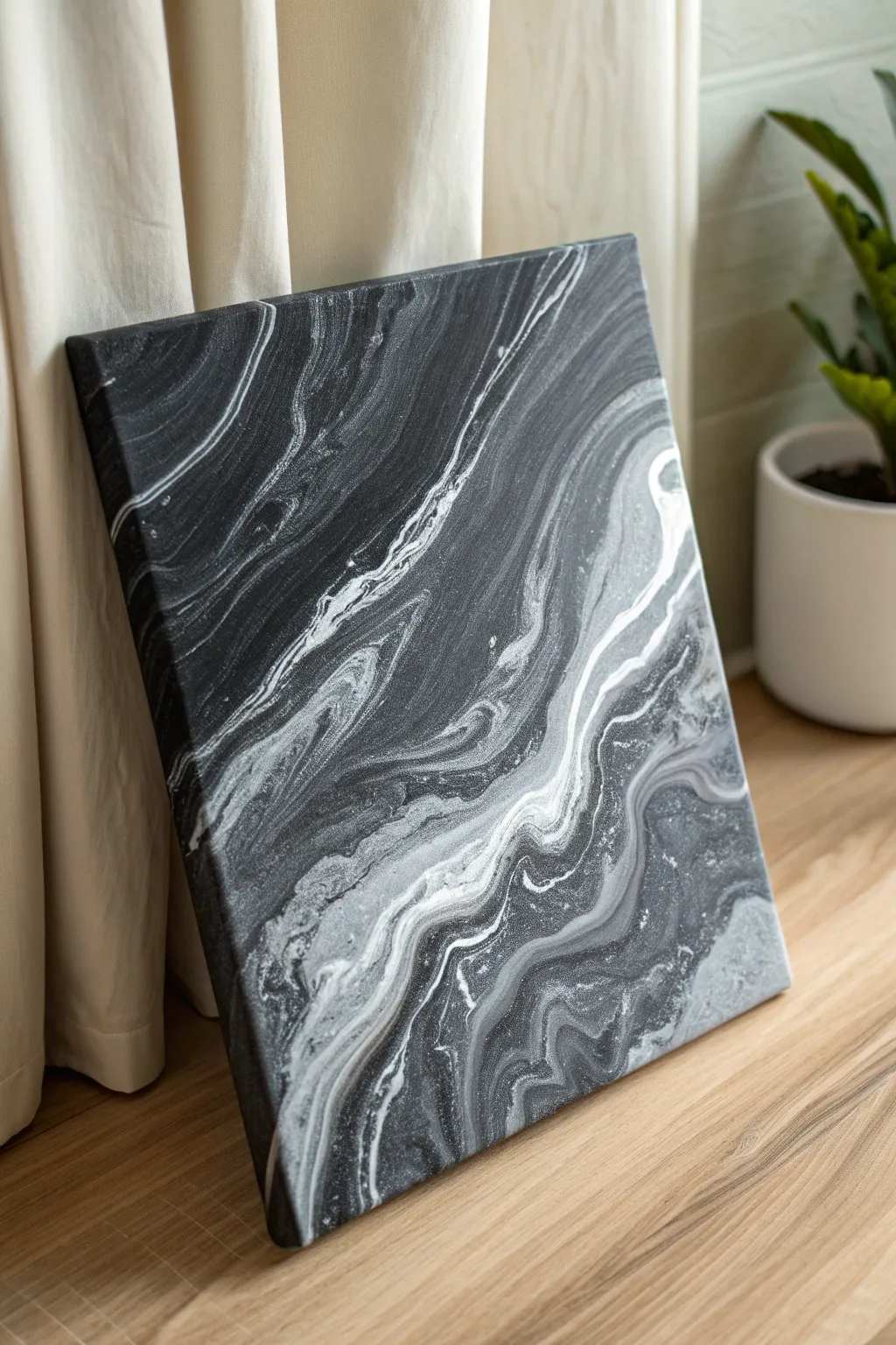 Marbled black and grey flow painting with soft white cells, minimalist contrast and boho calm