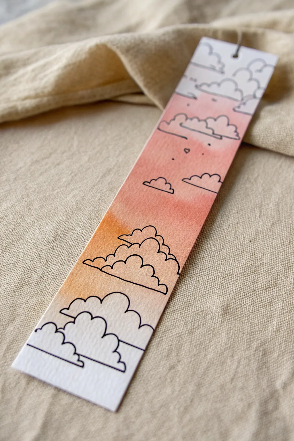 Capture the magic of golden hour with this dreamy gradient cloud bookmark drawing.
