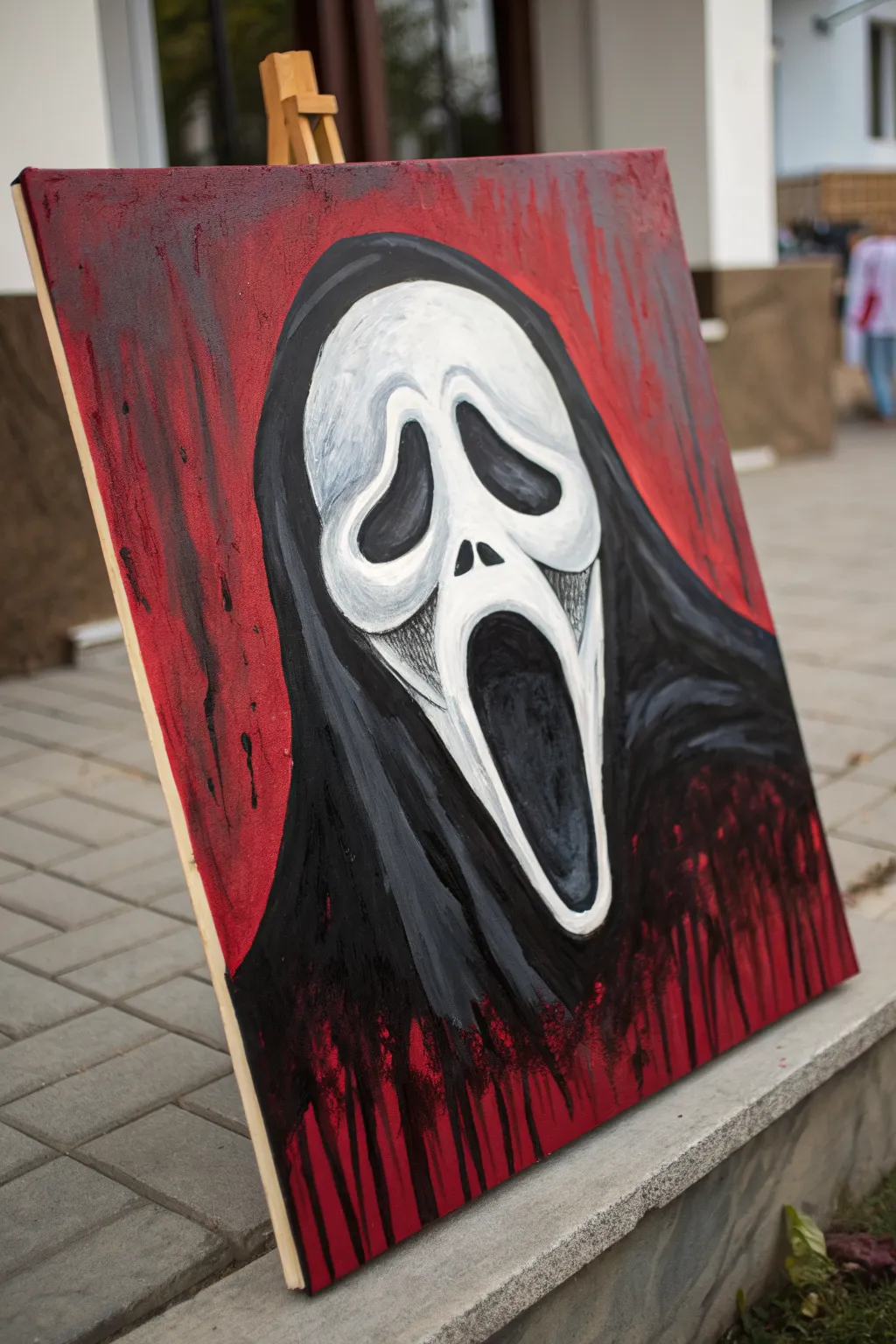 Minimalist Scream mask acrylic on deep red, moody edges and bold contrast for easy spooky art